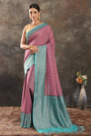Shop gorgeous pink georgette sari online in USA with antique zari sea green border. Be vision of elegance on special occasions in exquisite designer sarees, handwoven sarees, georgette sarees, embroidered sarees, Banarasi sarees from Pure Elegance Indian saree store in USA.-full view