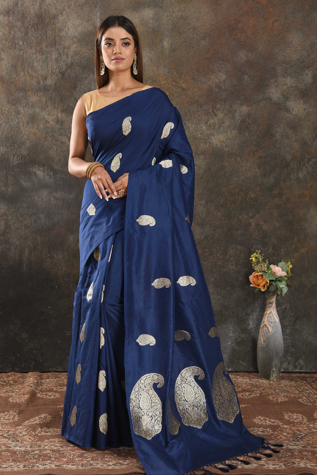 Shop beautiful indigo blue silk sari online in USA with silver zari paisley buta. Be vision of elegance on special occasions in exquisite designer sarees, handwoven sarees, georgette sarees, embroidered sarees, Banarasi sarees from Pure Elegance Indian saree store in USA.-full view