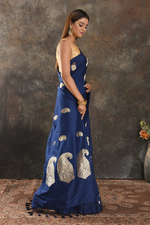 Shop beautiful indigo blue silk sari online in USA with silver zari paisley buta. Be vision of elegance on special occasions in exquisite designer sarees, handwoven sarees, georgette sarees, embroidered sarees, Banarasi sarees from Pure Elegance Indian saree store in USA.-side