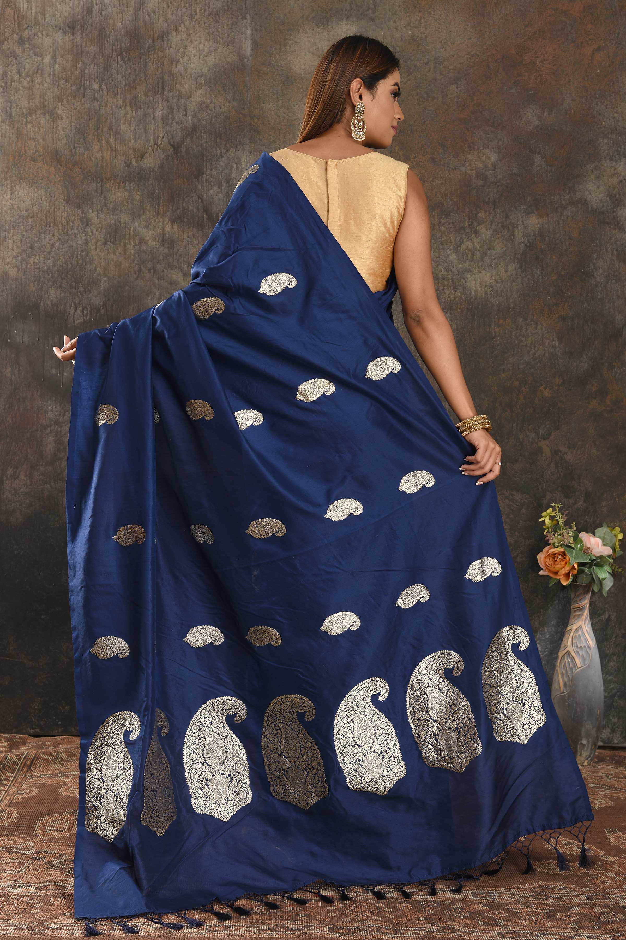 Shop beautiful indigo blue silk sari online in USA with silver zari paisley buta. Be vision of elegance on special occasions in exquisite designer sarees, handwoven sarees, georgette sarees, embroidered sarees, Banarasi sarees from Pure Elegance Indian saree store in USA.-back
