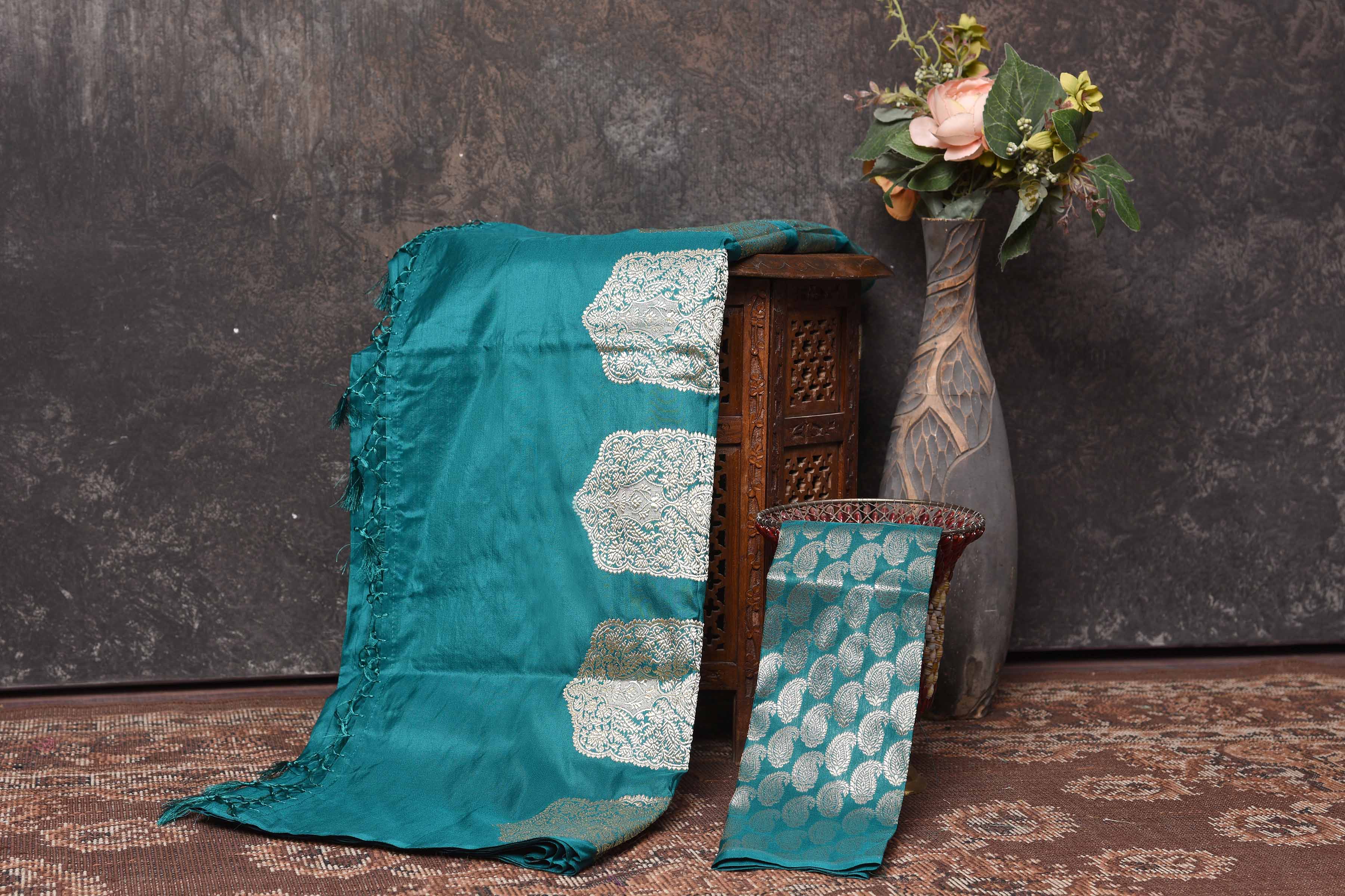 Shop sea green silk sari online in USA with silver zari paisley buta. Be vision of elegance on special occasions in exquisite designer sarees, handwoven sarees, georgette sarees, embroidered sarees, Banarasi sarees from Pure Elegance Indian saree store in USA.-blouse