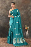 Shop sea green silk sari online in USA with silver zari paisley buta. Be vision of elegance on special occasions in exquisite designer sarees, handwoven sarees, georgette sarees, embroidered sarees, Banarasi sarees from Pure Elegance Indian saree store in USA.-full view