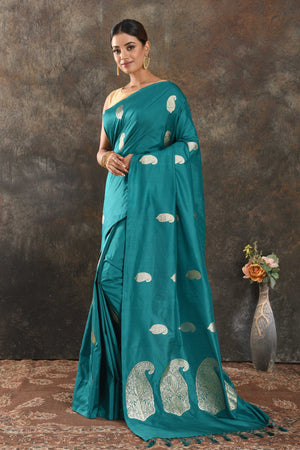 Shop sea green silk sari online in USA with silver zari paisley buta. Be vision of elegance on special occasions in exquisite designer sarees, handwoven sarees, georgette sarees, embroidered sarees, Banarasi sarees from Pure Elegance Indian saree store in USA.-pallu