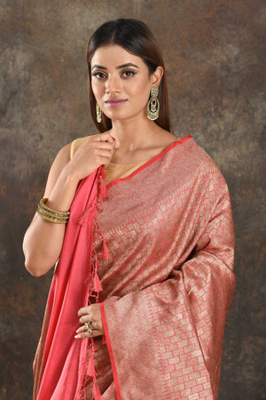 Buy peachish pink Banarasi silk saree online in USA with overall zari work. Be vision of elegance on special occasions in exquisite designer sarees, handwoven sarees, georgette sarees, embroidered sarees, Banarasi sarees from Pure Elegance Indian saree store in USA.-closeup