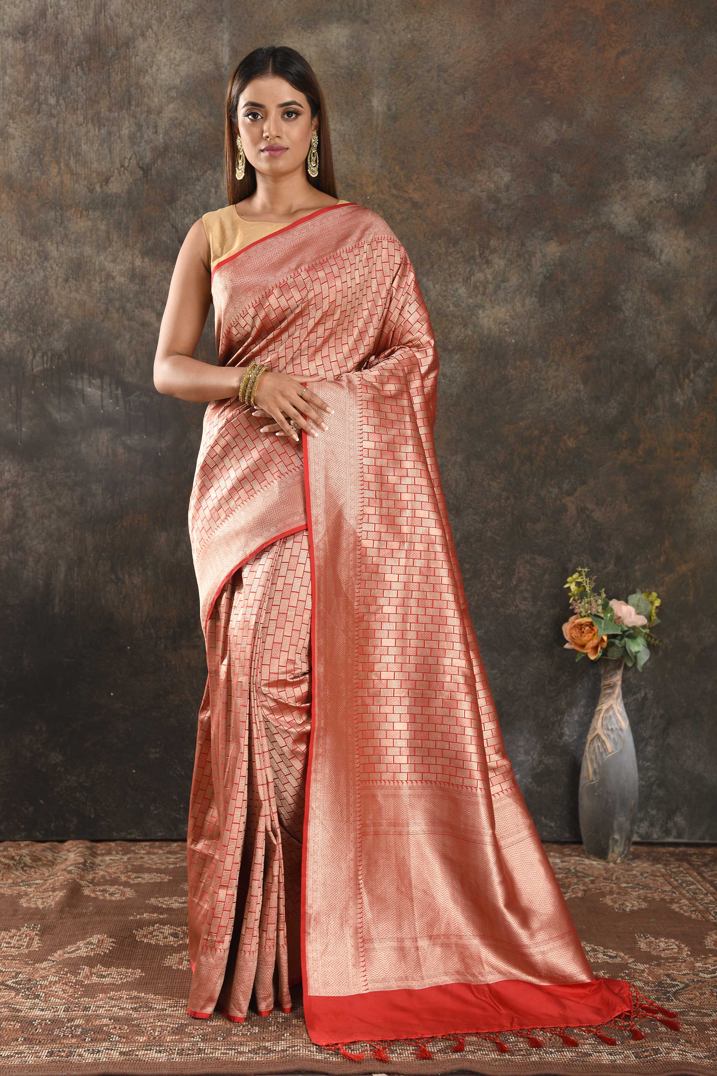 Buy beautiful red Banarasi silk saree online in USA with overall zari work. Be vision of elegance on special occasions in exquisite designer sarees, handwoven sarees, georgette sarees, embroidered sarees, Banarasi sarees from Pure Elegance Indian saree store in USA.-full view