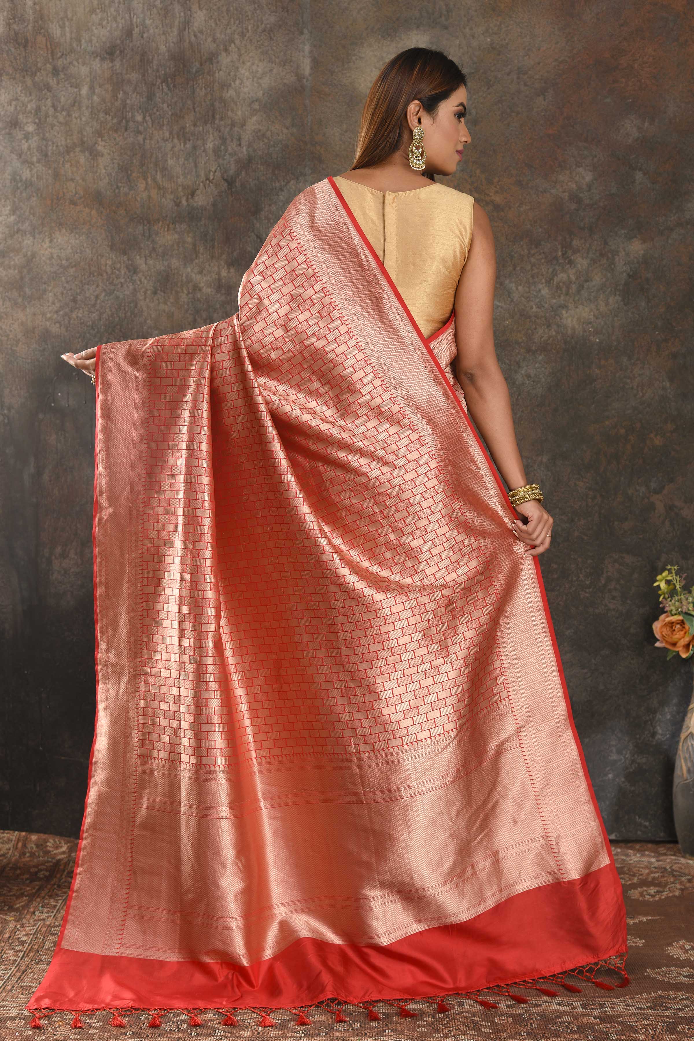 Buy beautiful red Banarasi silk saree online in USA with overall zari work. Be vision of elegance on special occasions in exquisite designer sarees, handwoven sarees, georgette sarees, embroidered sarees, Banarasi sarees from Pure Elegance Indian saree store in USA.-back