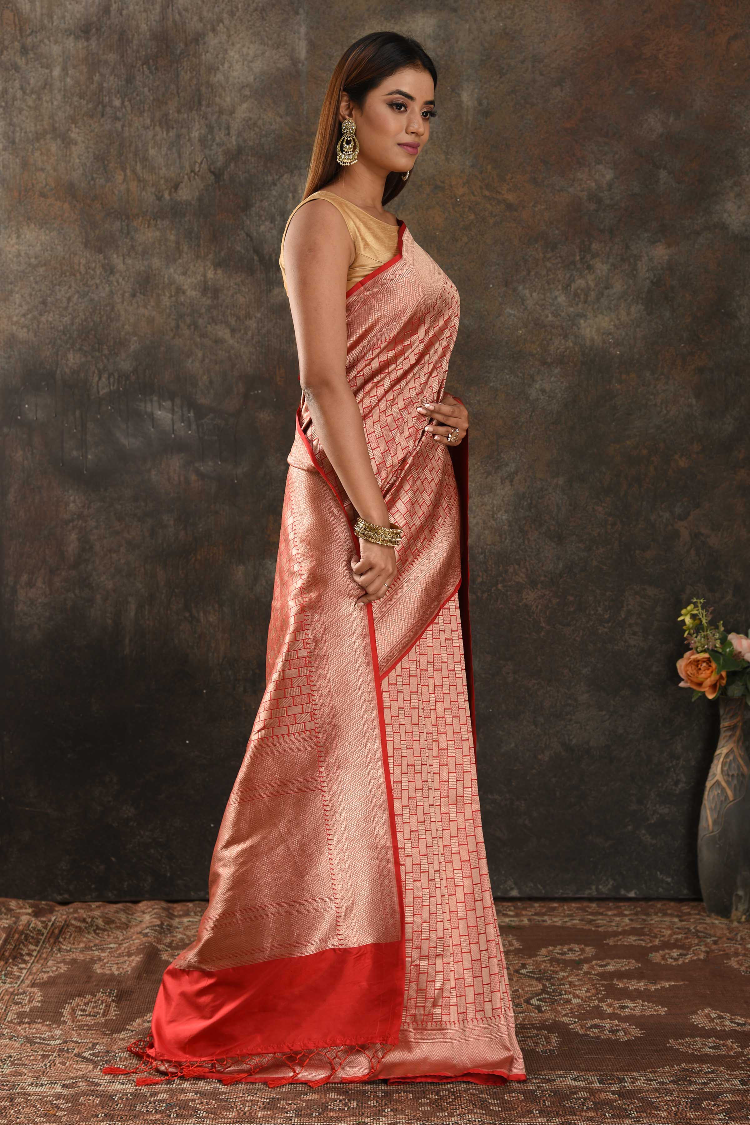 Buy beautiful red Banarasi silk saree online in USA with overall zari work. Be vision of elegance on special occasions in exquisite designer sarees, handwoven sarees, georgette sarees, embroidered sarees, Banarasi sarees from Pure Elegance Indian saree store in USA.-side