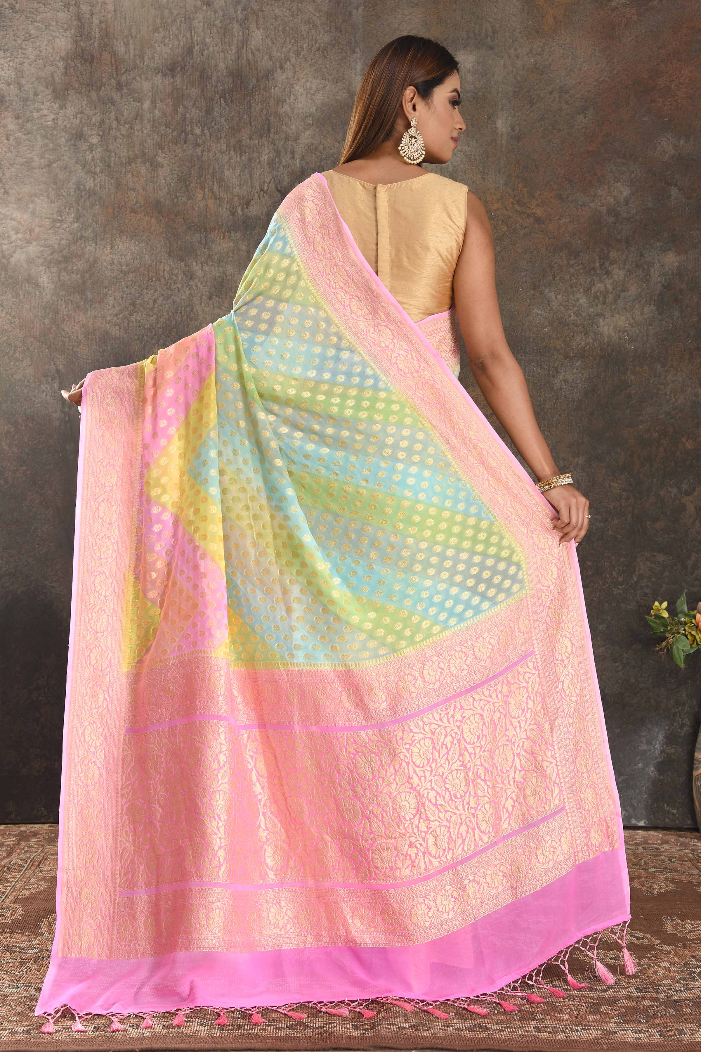 Buy stunning multicolor pastel georgette Banarasi saree online in USA with pink zari border. Be vision of elegance on special occasions in exquisite designer sarees, handwoven sarees, georgette sarees, embroidered sarees, Banarasi sarees from Pure Elegance Indian saree store in USA.-back