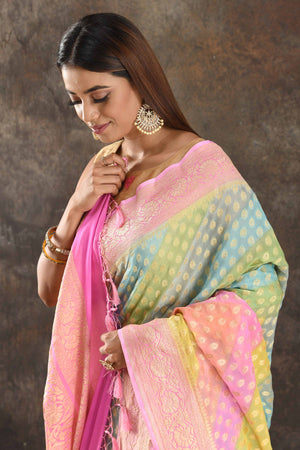 Buy stunning multicolor pastel georgette Banarasi saree online in USA with pink zari border. Be vision of elegance on special occasions in exquisite designer sarees, handwoven sarees, georgette sarees, embroidered sarees, Banarasi sarees from Pure Elegance Indian saree store in USA.-closeup