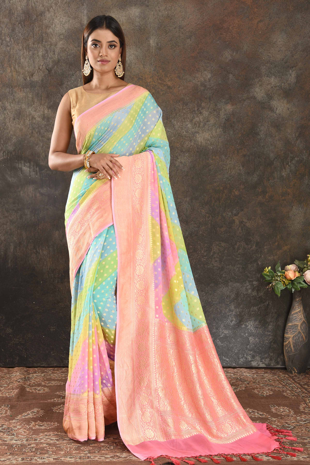 Buy pastel green and blue georgette Banarasi saree online in USA with pink zari border. Be vision of elegance on special occasions in exquisite designer sarees, handwoven sarees, georgette sarees, embroidered sarees, Banarasi sarees from Pure Elegance Indian saree store in USA.-full view