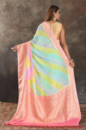 Buy pastel green and blue georgette Banarasi saree online in USA with pink zari border. Be vision of elegance on special occasions in exquisite designer sarees, handwoven sarees, georgette sarees, embroidered sarees, Banarasi sarees from Pure Elegance Indian saree store in USA.-back