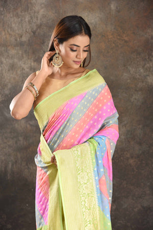 Shop beautiful multicolor Banarasi georgette saree online in USA with green zari border. Be vision of elegance on special occasions in exquisite designer sarees, handwoven sarees, georgette sarees, embroidered sarees, Banarasi sarees from Pure Elegance Indian saree store in USA.-closeup
