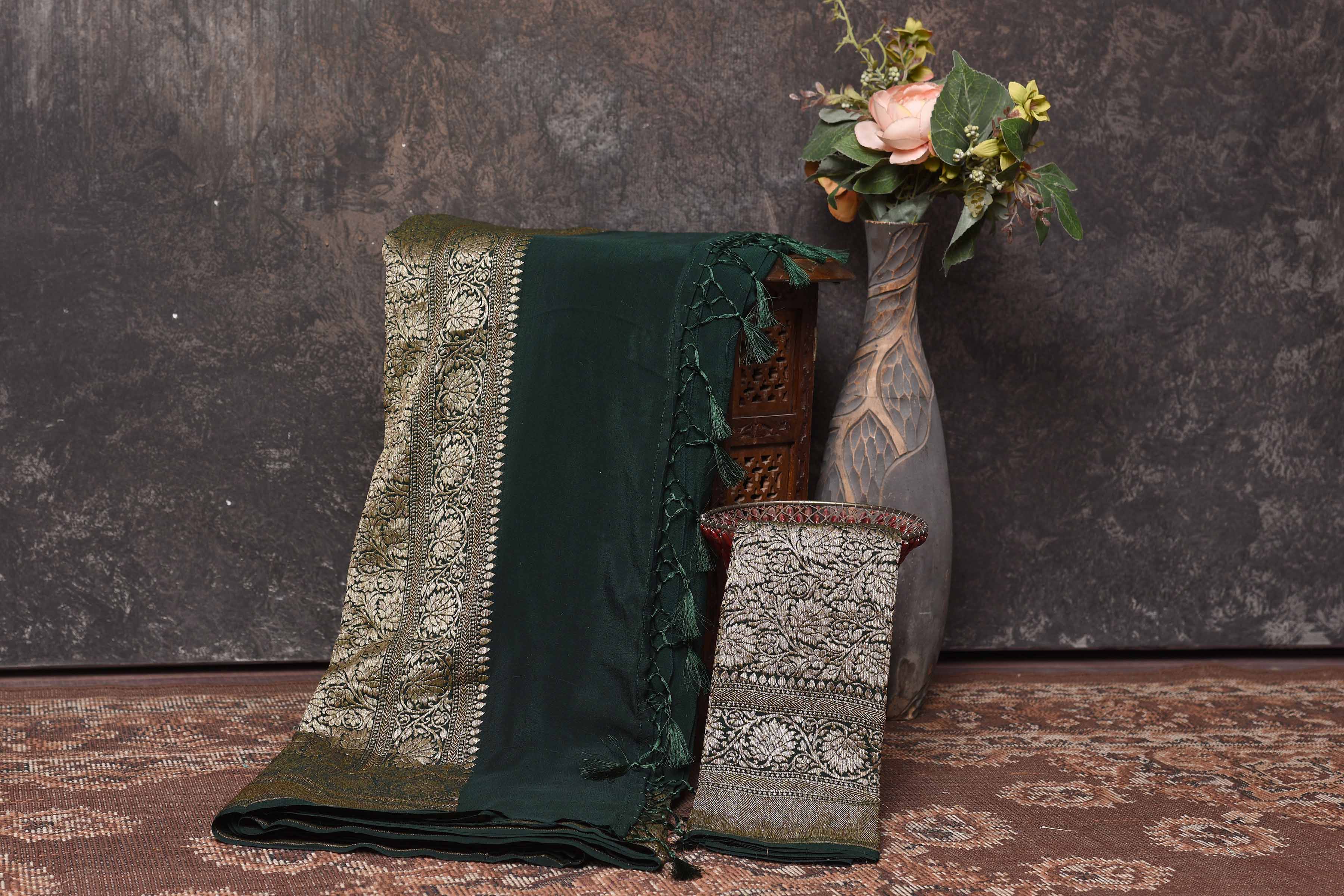 Shop beautiful bottle green crepe saree online in USA with antique zari border. Be vision of elegance on special occasions in exquisite designer sarees, handwoven sarees, georgette sarees, embroidered sarees, Banarasi sarees from Pure Elegance Indian saree store in USA.-blouse