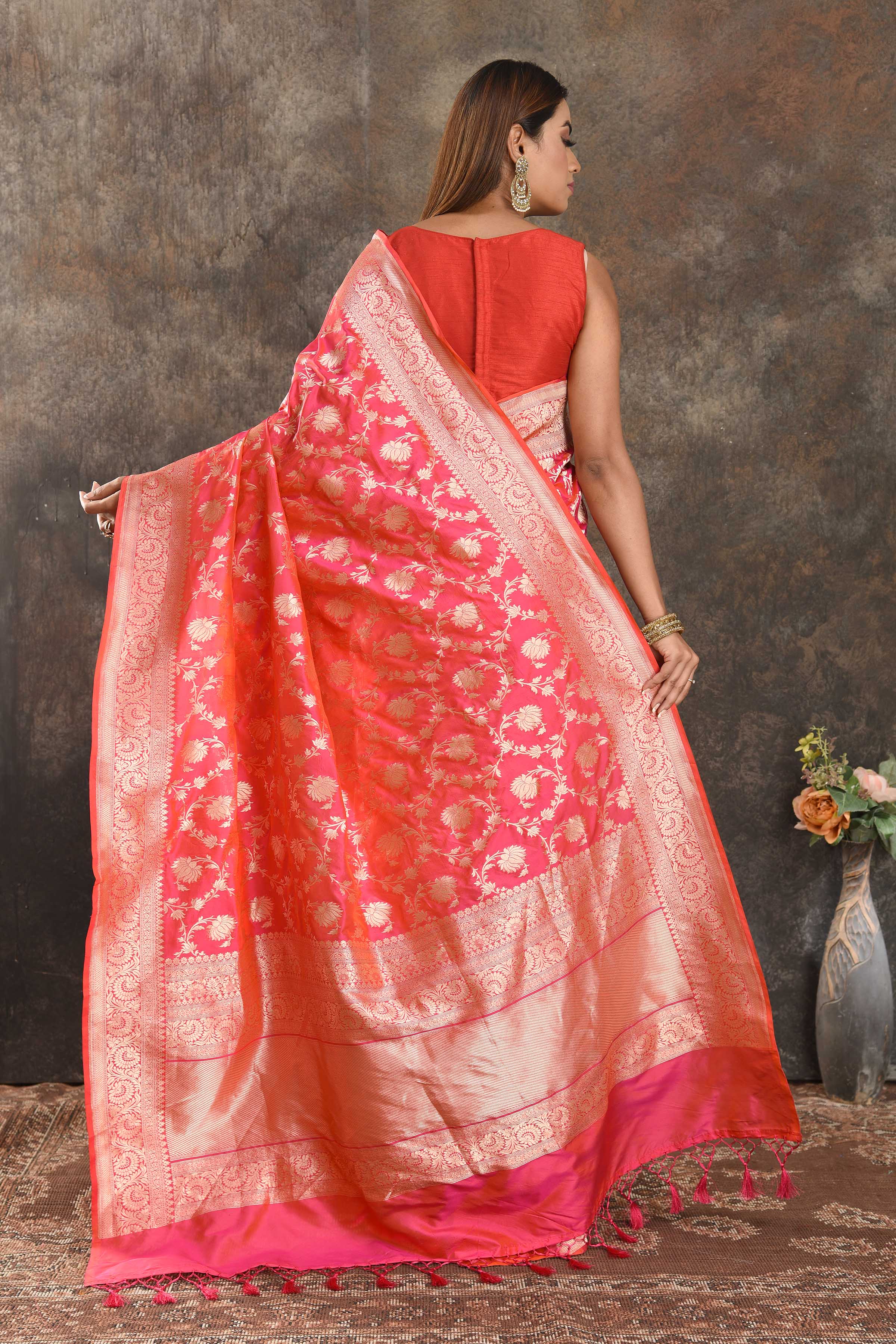 Buy beautiful pink silk saree online in USA with overall zari jaal. Be vision of elegance on special occasions in exquisite designer sarees, handwoven sarees, georgette sarees, embroidered sarees, Banarasi saree, pure silk saris from Pure Elegance Indian saree store in USA.-back