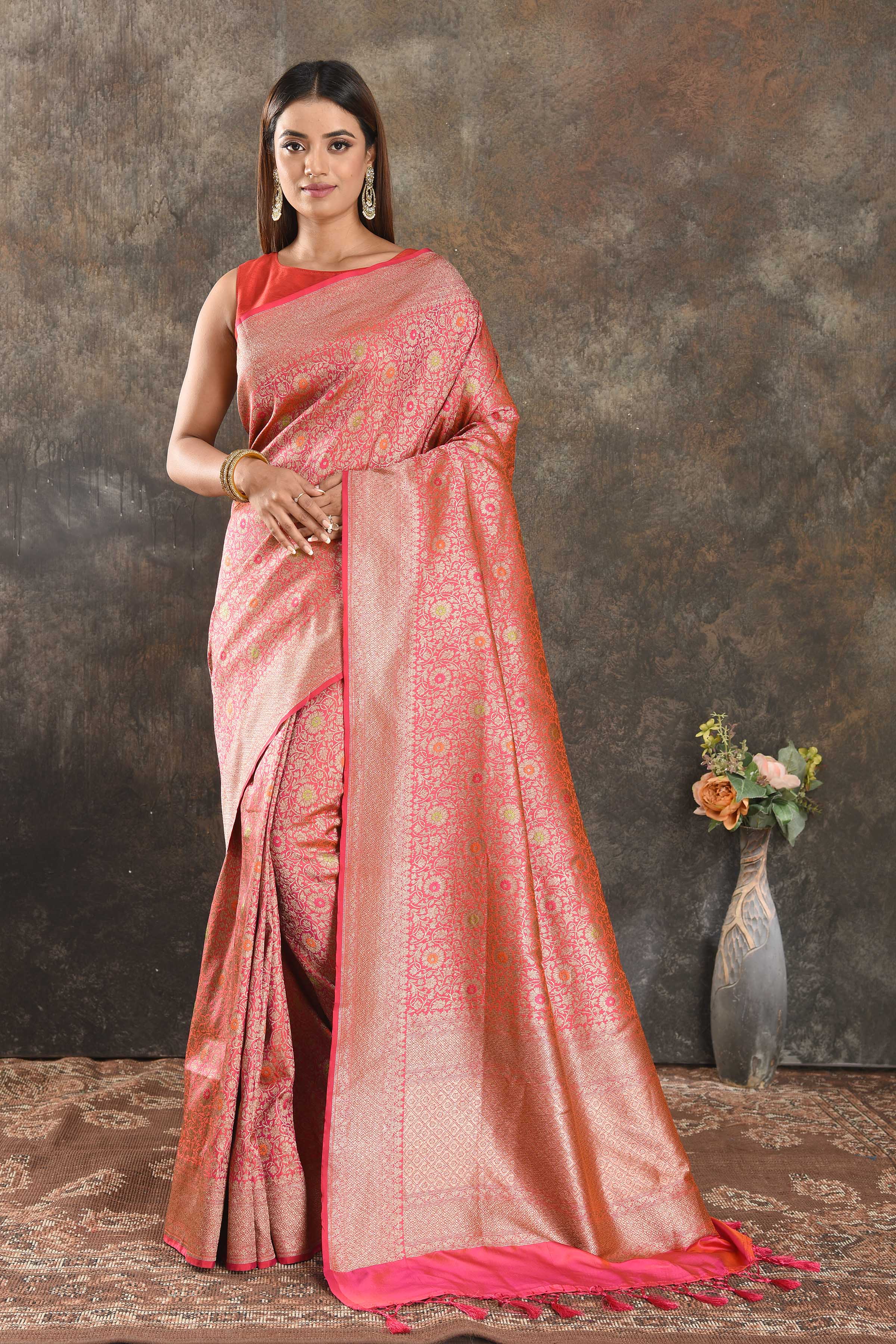 Shop stunning orangish pink silk saree online in USA with overall zari jaal. Be vision of elegance on special occasions in exquisite designer sarees, handwoven sarees, georgette sarees, embroidered sarees, Banarasi saree, pure silk saris from Pure Elegance Indian saree store in USA.-full view