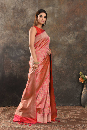 Shop stunning orangish pink silk saree online in USA with overall zari jaal. Be vision of elegance on special occasions in exquisite designer sarees, handwoven sarees, georgette sarees, embroidered sarees, Banarasi saree, pure silk saris from Pure Elegance Indian saree store in USA.-side
