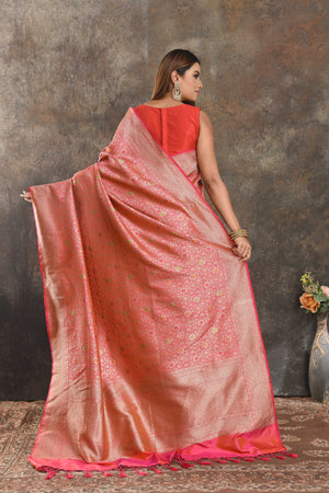 Shop stunning orangish pink silk saree online in USA with overall zari jaal. Be vision of elegance on special occasions in exquisite designer sarees, handwoven sarees, georgette sarees, embroidered sarees, Banarasi saree, pure silk saris from Pure Elegance Indian saree store in USA.-back