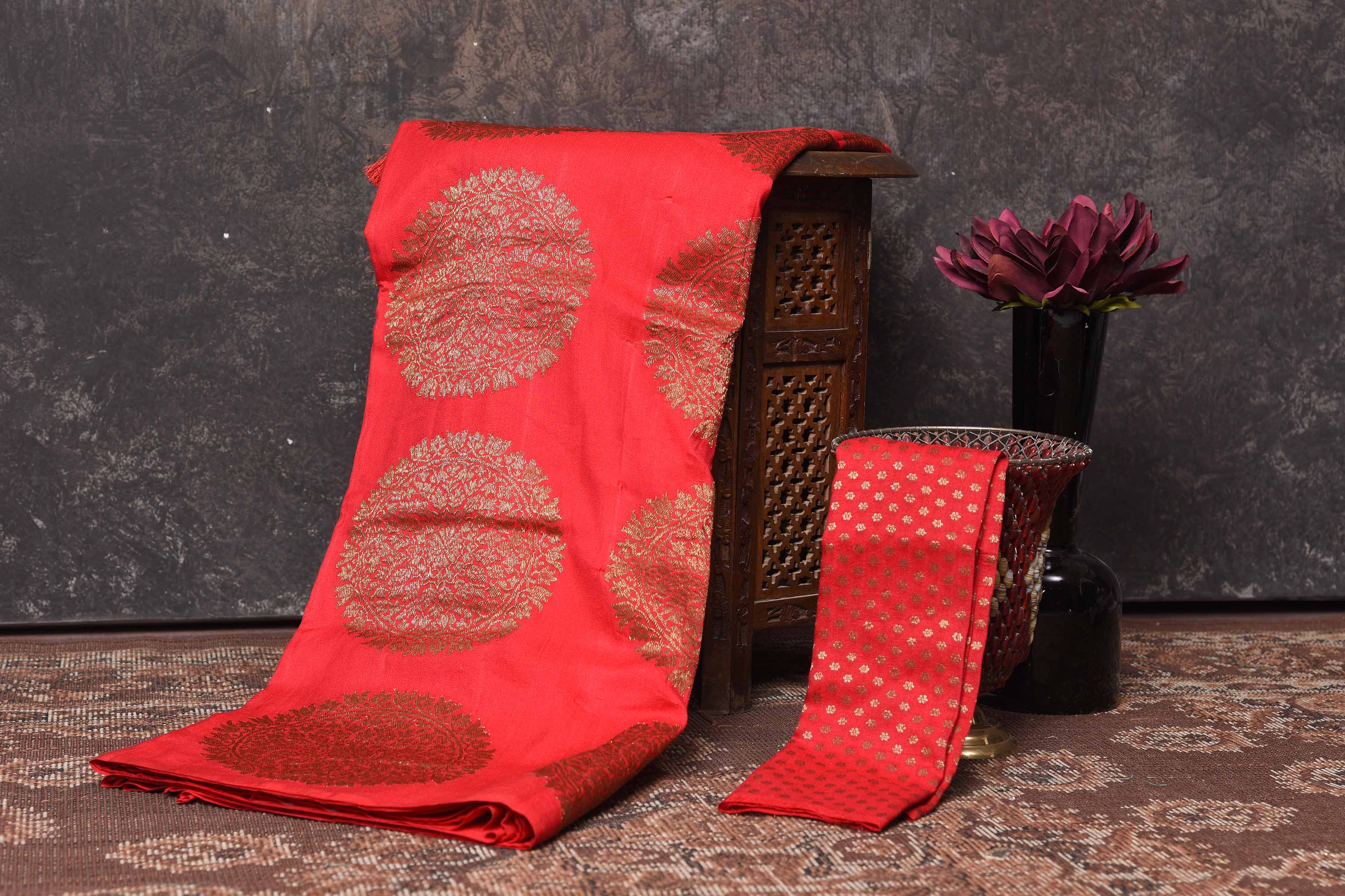 Shop red Muga Banarasi saree online in USA with antique zari motifs. Be vision of elegance on special occasions in exquisite designer sarees, handwoven sarees, georgette sarees, embroidered sarees, Banarasi saree, pure silk saris from Pure Elegance Indian saree store in USA.-blouse