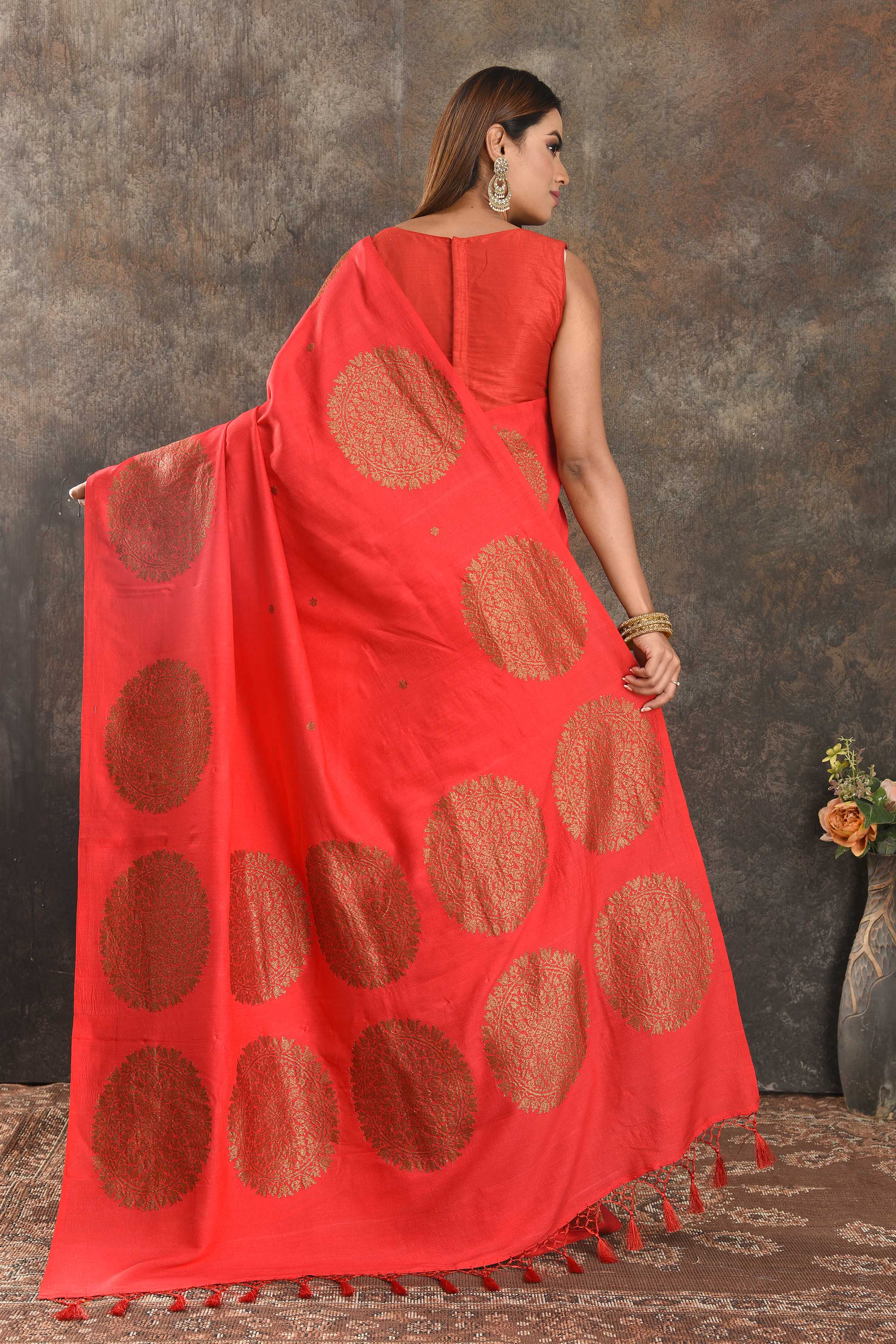 Shop red Muga Banarasi saree online in USA with antique zari motifs. Be vision of elegance on special occasions in exquisite designer sarees, handwoven sarees, georgette sarees, embroidered sarees, Banarasi saree, pure silk saris from Pure Elegance Indian saree store in USA.-back