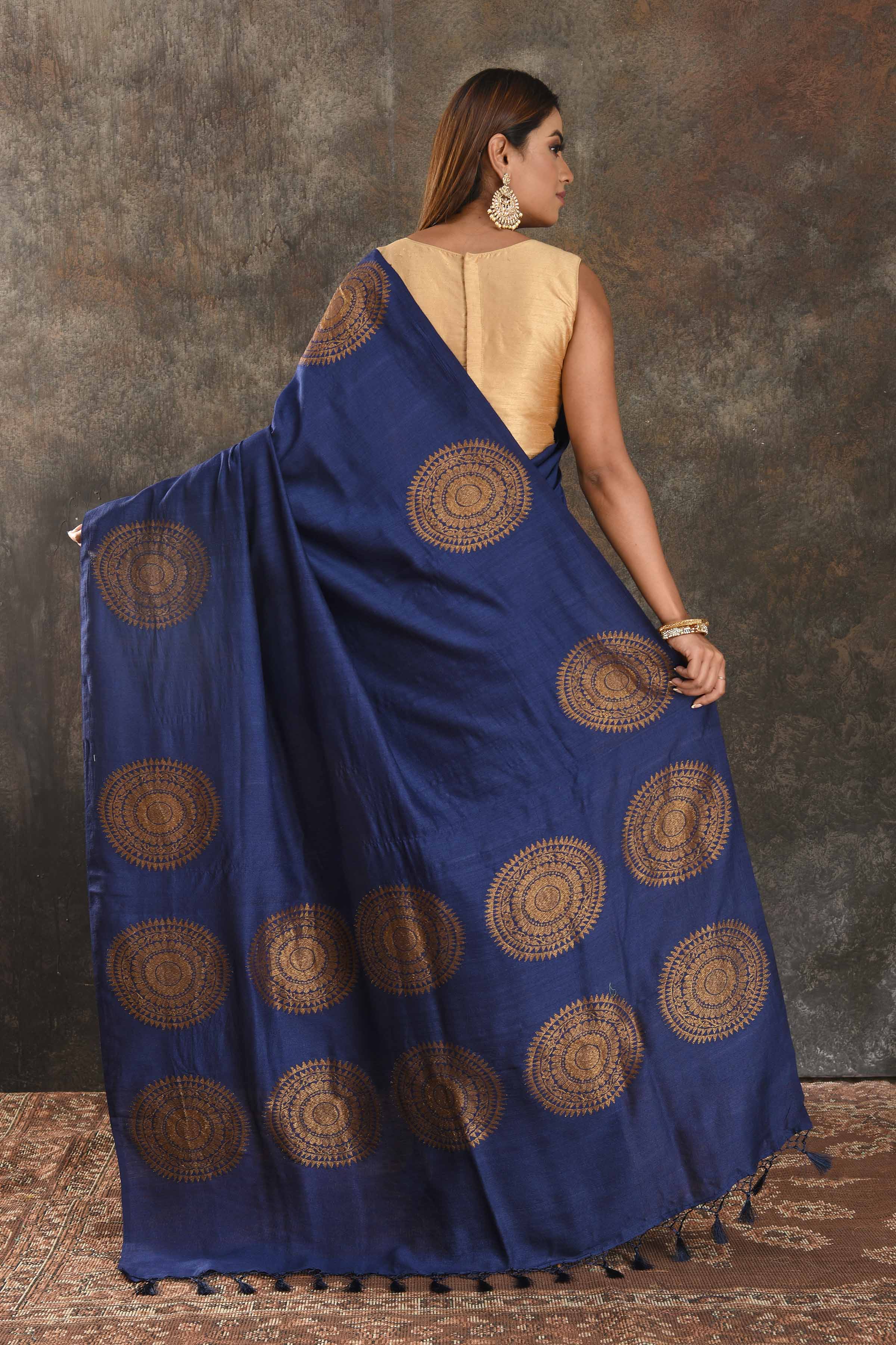 Buy dark blue Muga Banarasi sari online in USA with antique zari motifs. Be vision of elegance on special occasions in exquisite designer sarees, handwoven sarees, georgette sarees, embroidered sarees, Banarasi saree, pure silk saris from Pure Elegance Indian saree store in USA.-back