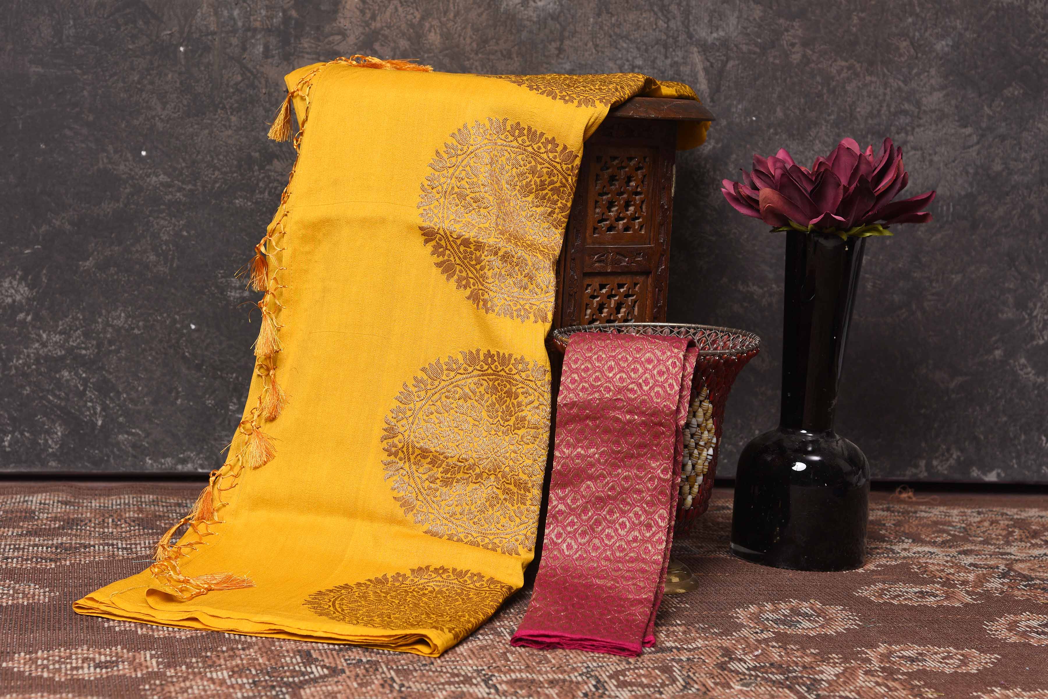 Buy yellow Muga Banarasi sari online in USA with antique zari motifs. Be vision of elegance on special occasions in exquisite designer sarees, handwoven sarees, georgette sarees, embroidered sarees, Banarasi saree, pure silk saris from Pure Elegance Indian saree store in USA.-blouse