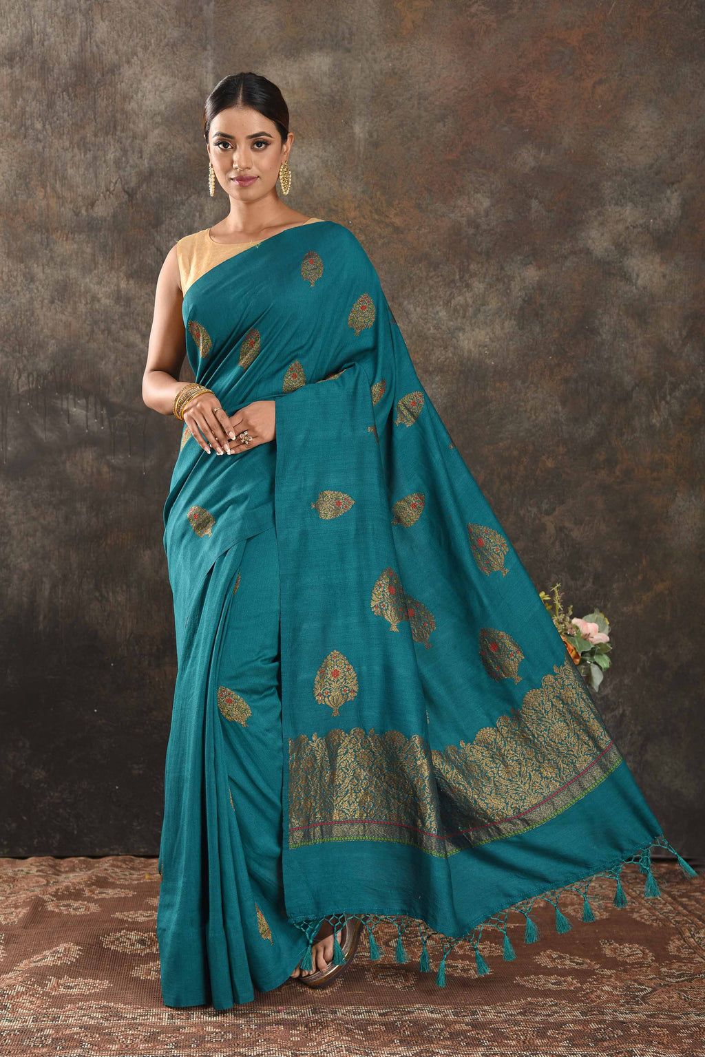 Shop beautiful teal Muga Banarasi sari online in USA with antique zari tree buta. Be vision of elegance on special occasions in exquisite designer sarees, handwoven sarees, georgette sarees, embroidered sarees, Banarasi saree, pure silk saris from Pure Elegance Indian saree store in USA.-full view