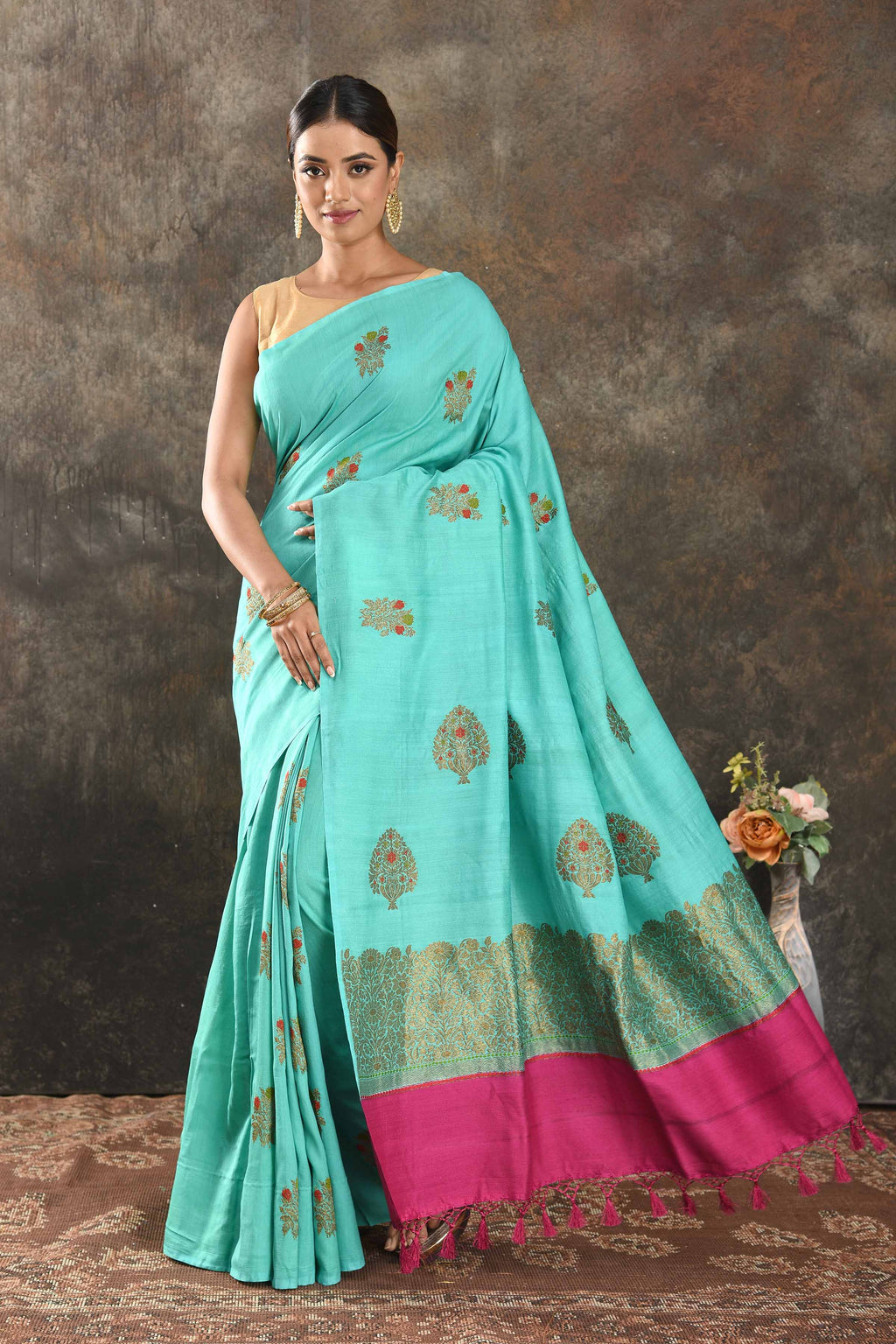 Shop stunning pastel blue Muga Banarasi sari online in USA with antique zari tree buta. Be vision of elegance on special occasions in exquisite designer sarees, handwoven sarees, georgette sarees, embroidered sarees, Banarasi saree, pure silk saris from Pure Elegance Indian saree store in USA.-full view