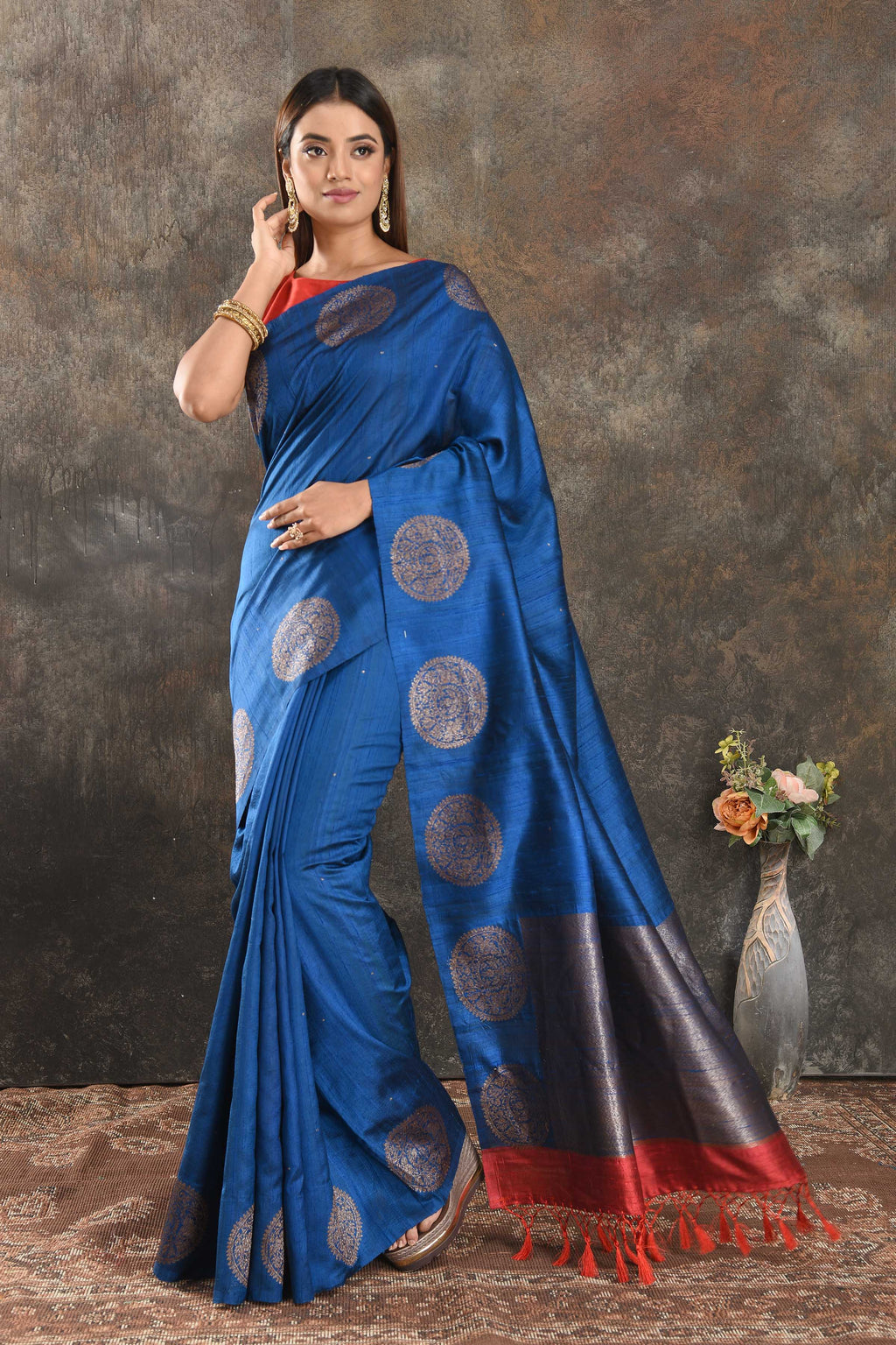 Shop beautiful royal blue tussar Banarasi sari online in USA with zari buta. Be vision of elegance on special occasions in exquisite designer sarees, handwoven sarees, georgette sarees, embroidered sarees, Banarasi saree, pure silk saris from Pure Elegance Indian saree store in USA.-full view