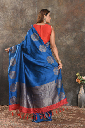 Shop beautiful royal blue tussar Banarasi sari online in USA with zari buta. Be vision of elegance on special occasions in exquisite designer sarees, handwoven sarees, georgette sarees, embroidered sarees, Banarasi saree, pure silk saris from Pure Elegance Indian saree store in USA.-back