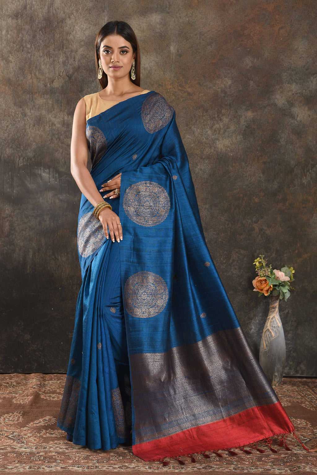 Buy royal blue tussar Banarasi sari online in USA with antiquqe zari buta. Be vision of elegance on special occasions in exquisite designer sarees, handwoven sarees, georgette sarees, embroidered sarees, Banarasi saree, pure silk saris from Pure Elegance Indian saree store in USA.-full view