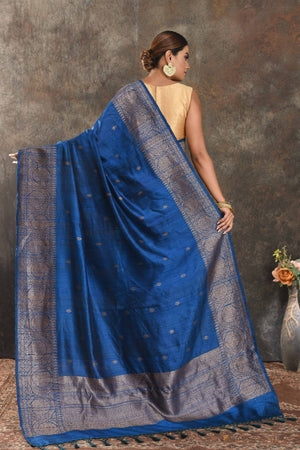 Shop stunning blue tussar Banarasi sari online in USA with antique zari border. Be vision of elegance on special occasions in exquisite designer sarees, handwoven sarees, georgette sarees, embroidered sarees, Banarasi saree, pure silk saris from Pure Elegance Indian saree store in USA.-back