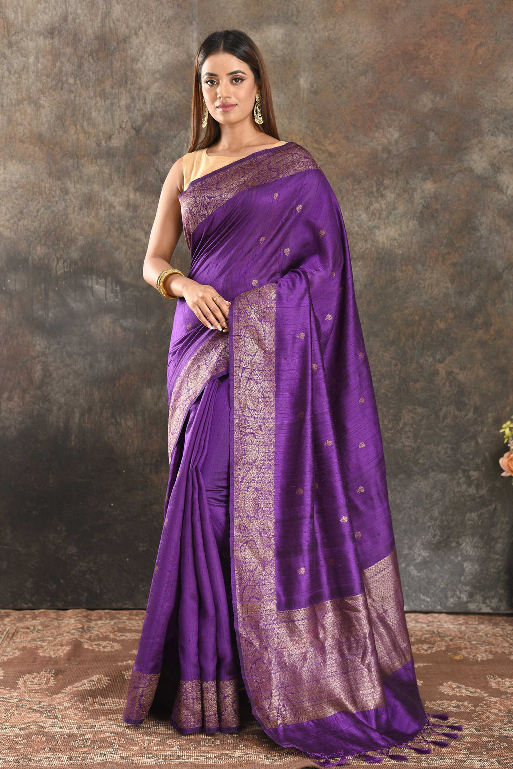 Buy beautiful purple tussar Banarasi sari online in USA with antique zari border. Be vision of elegance on special occasions in exquisite designer sarees, handwoven sarees, georgette sarees, embroidered sarees, Banarasi saree, pure silk saris, tussar sarees from Pure Elegance Indian saree store in USA.-full view