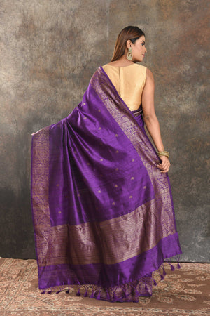Buy beautiful purple tussar Banarasi sari online in USA with antique zari border. Be vision of elegance on special occasions in exquisite designer sarees, handwoven sarees, georgette sarees, embroidered sarees, Banarasi saree, pure silk saris, tussar sarees from Pure Elegance Indian saree store in USA.-back