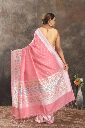 Shop stunning blush pink tussar Banarasi sari online in USA with silver zari border. Be vision of elegance on special occasions in exquisite designer sarees, handwoven sarees, georgette sarees, embroidered sarees, Banarasi saree, pure silk saris, tussar sarees from Pure Elegance Indian saree store in USA.-back