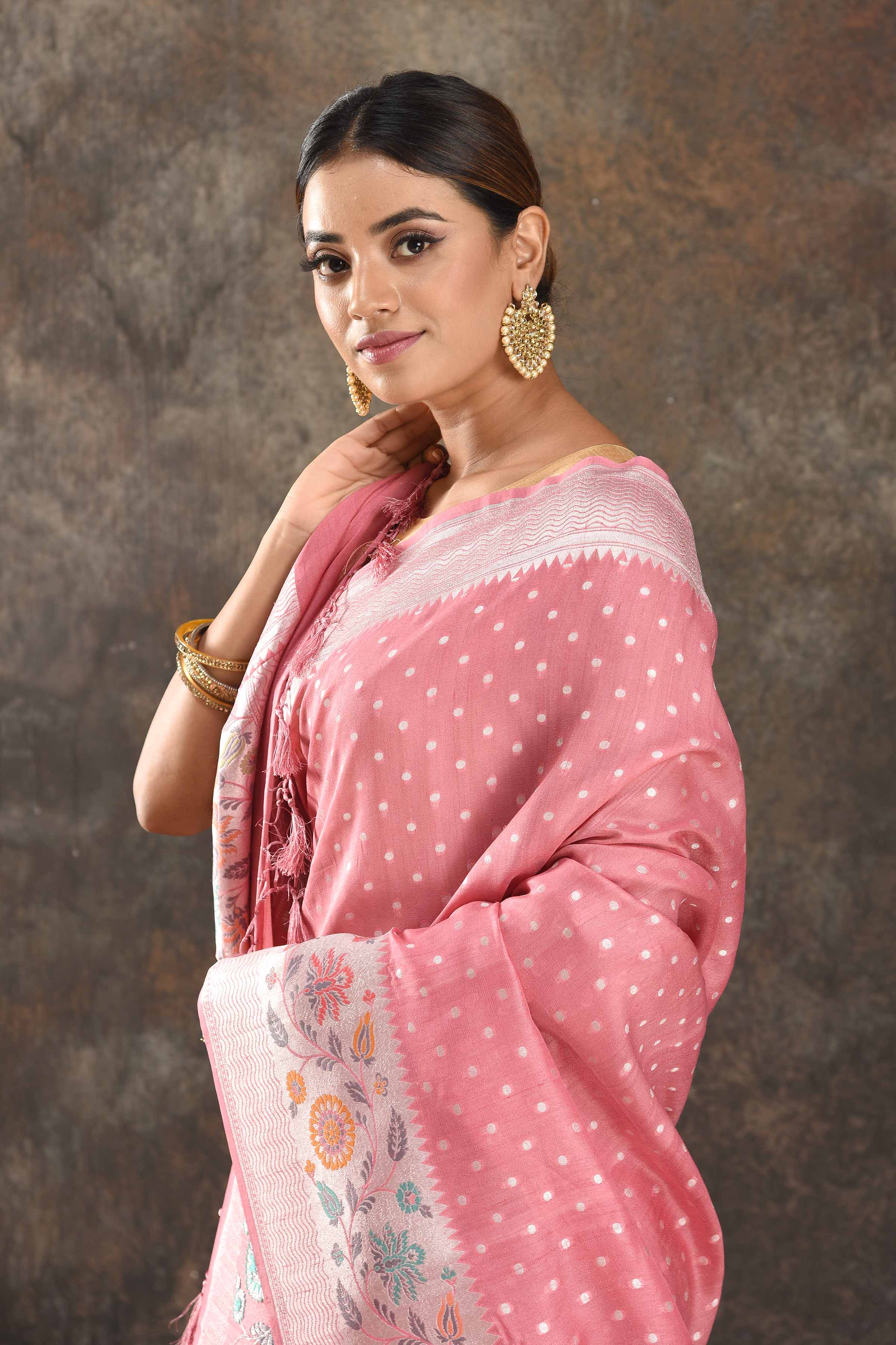 Shop stunning blush pink tussar Banarasi sari online in USA with silver zari border. Be vision of elegance on special occasions in exquisite designer sarees, handwoven sarees, georgette sarees, embroidered sarees, Banarasi saree, pure silk saris, tussar sarees from Pure Elegance Indian saree store in USA.-closeup