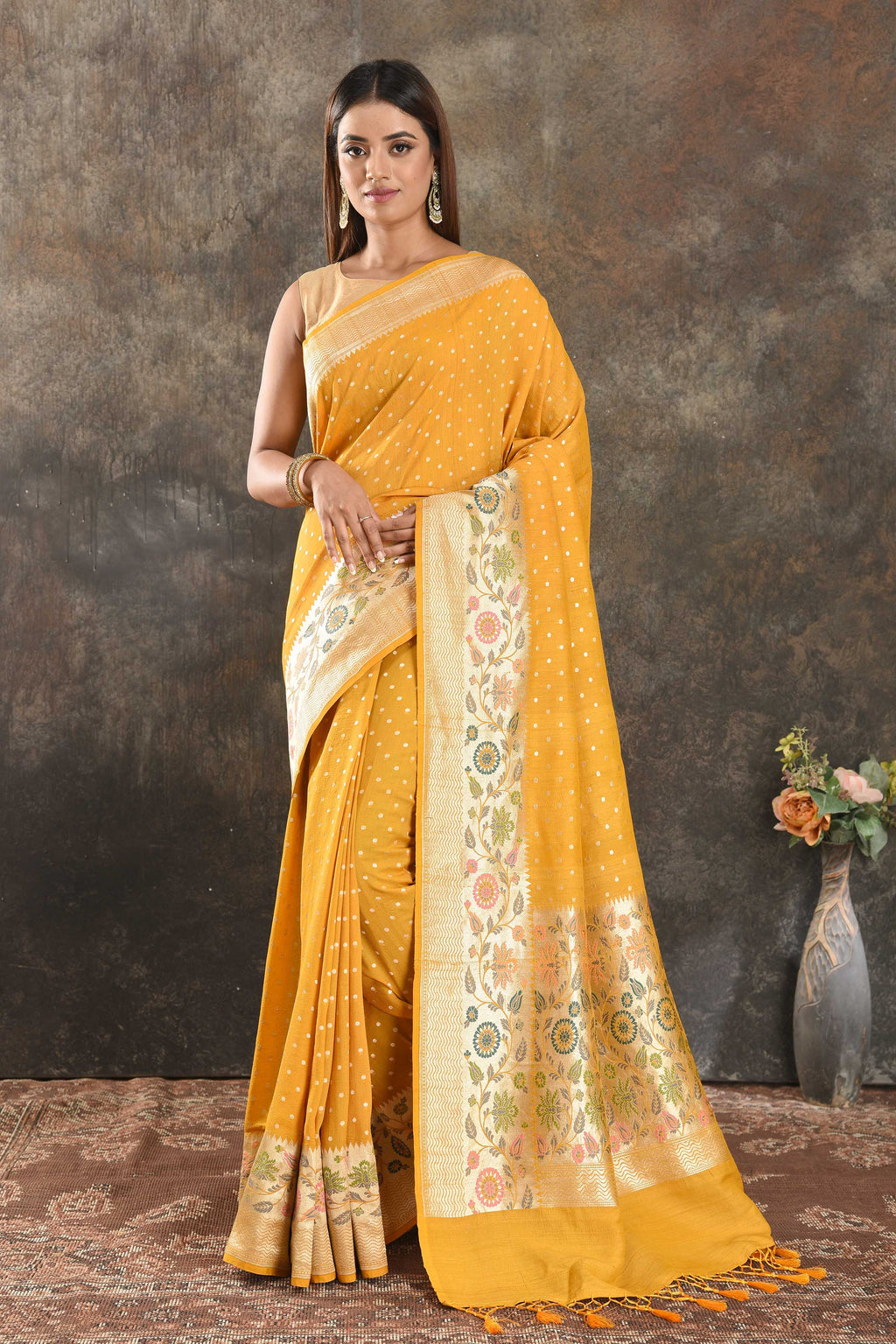Buy beautiful mango yellow tussar Banarasi sari online in USA with floral zari border. Be vision of elegance on special occasions in exquisite designer sarees, handwoven sarees, georgette sarees, embroidered sarees, Banarasi saree, pure silk saris, tussar sarees from Pure Elegance Indian saree store in USA.-full view