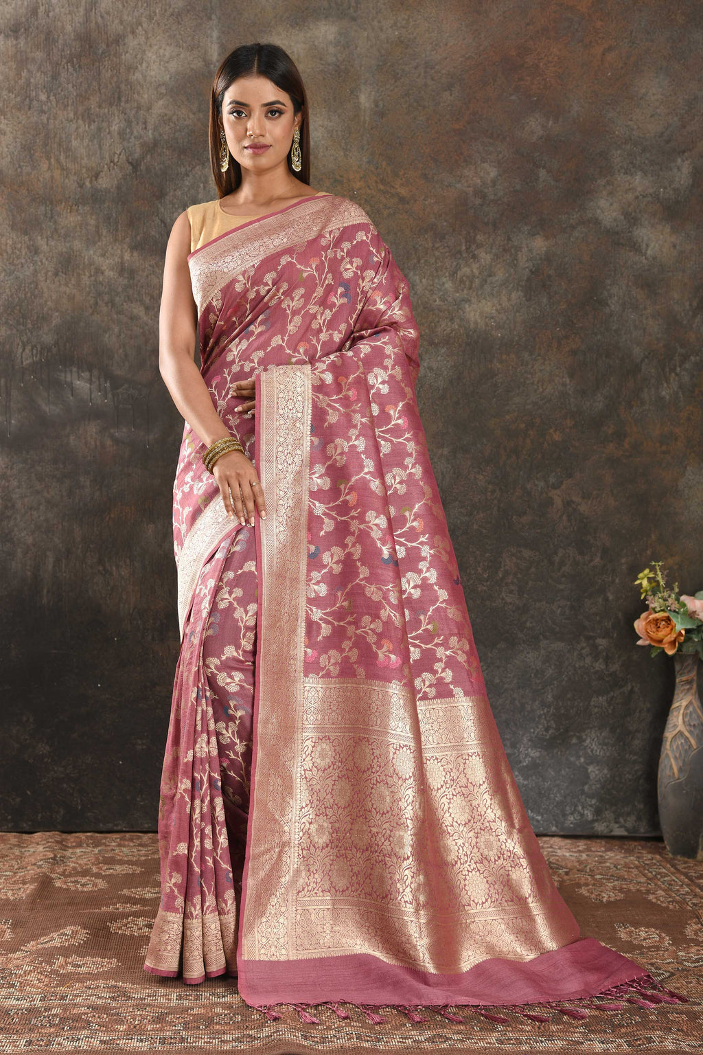 Shop beautiful onion pink tussar Banarasi saree online in USA with floral zari jaal. Be vision of elegance on special occasions in exquisite designer sarees, handwoven sarees, georgette sarees, embroidered sarees, Banarasi saree, pure silk saris, tussar sarees from Pure Elegance Indian saree store in USA.-full view