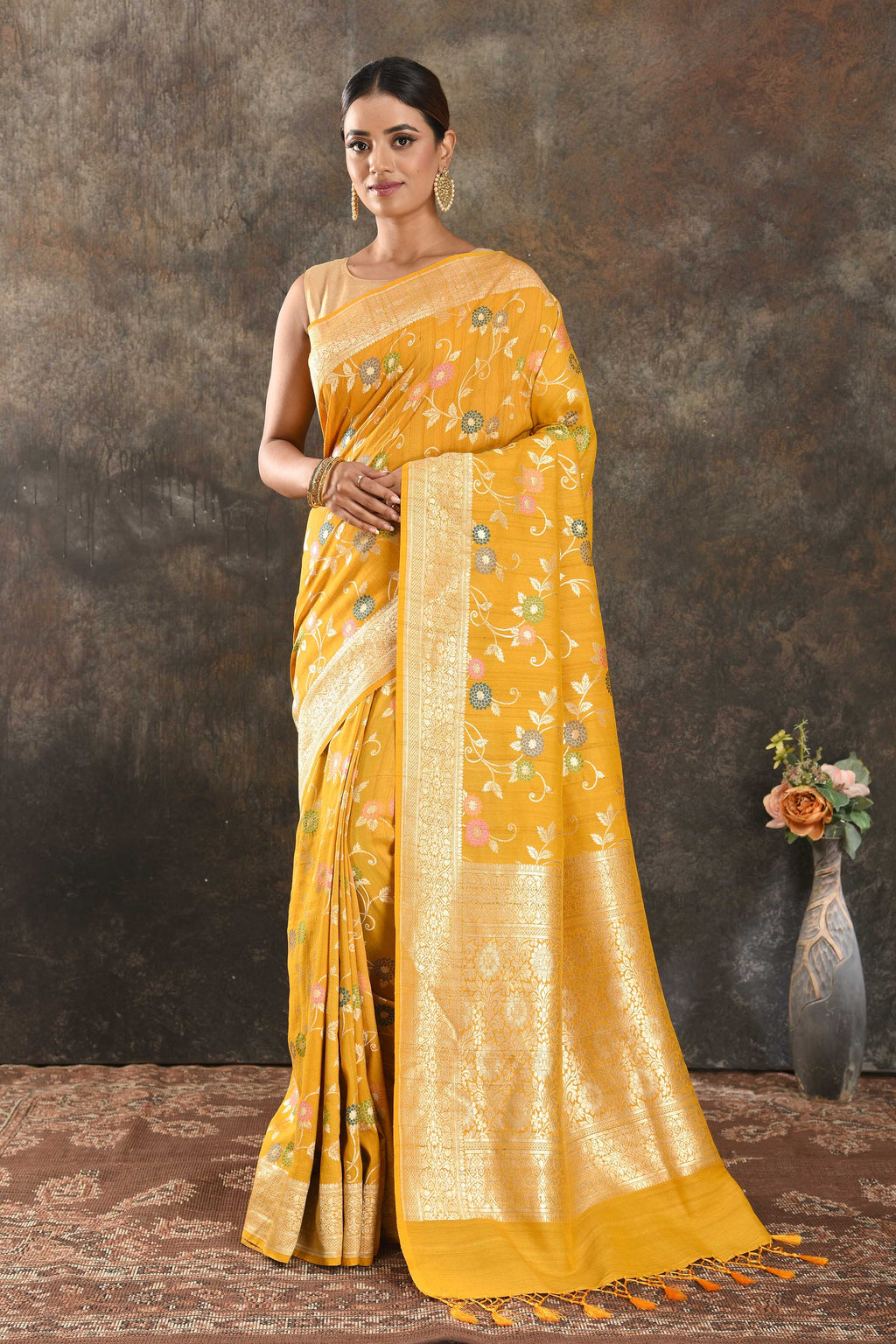 Buy beautiful mango yellow tussar Banarasi sari online in USA with floral zari minakari jaal. Be vision of elegance on special occasions in exquisite designer sarees, handwoven sarees, georgette sarees, embroidered sarees, Banarasi saree, pure silk saris, tussar sarees from Pure Elegance Indian saree store in USA.-full view