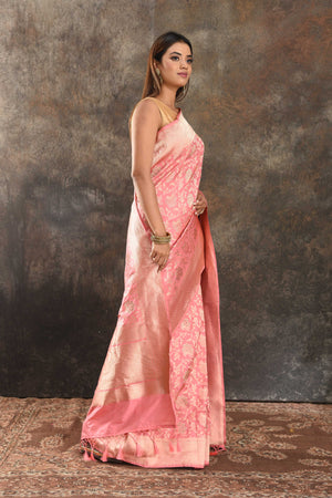 Buy beautiful pink Katan silk Banarasi sari online in USA with zari work. Be vision of elegance on special occasions in exquisite designer sarees, handwoven sarees, georgette sarees, embroidered sarees, Banarasi saree, pure silk saris, tussar sarees from Pure Elegance Indian saree store in USA.-side