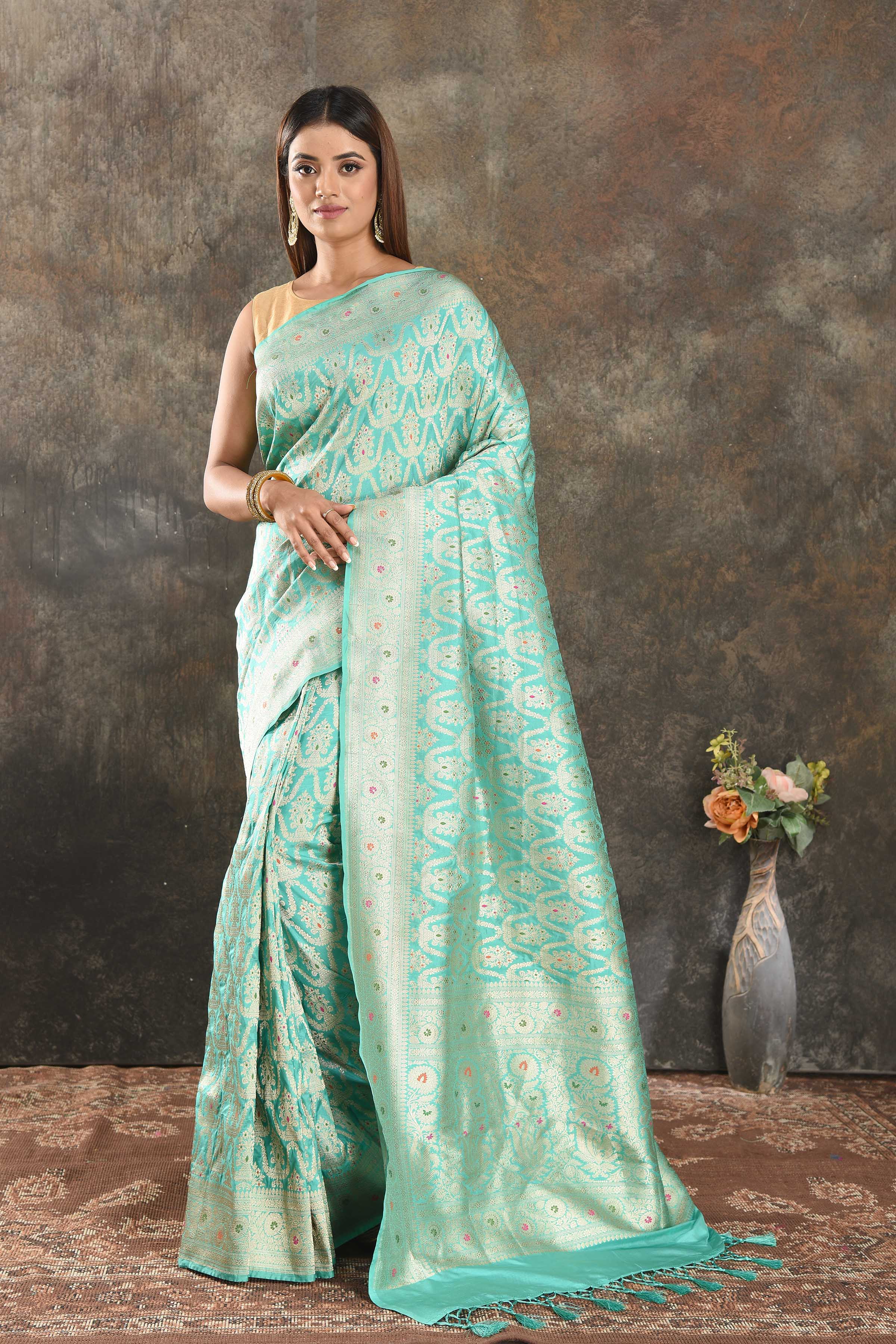 Shop pastel blue Katan silk Banarasi saree online in USA with zari work. Be vision of elegance on special occasions in exquisite designer sarees, handwoven sarees, georgette sarees, embroidered sarees, Banarasi saree, pure silk saris, tussar sarees from Pure Elegance Indian saree store in USA.-full view