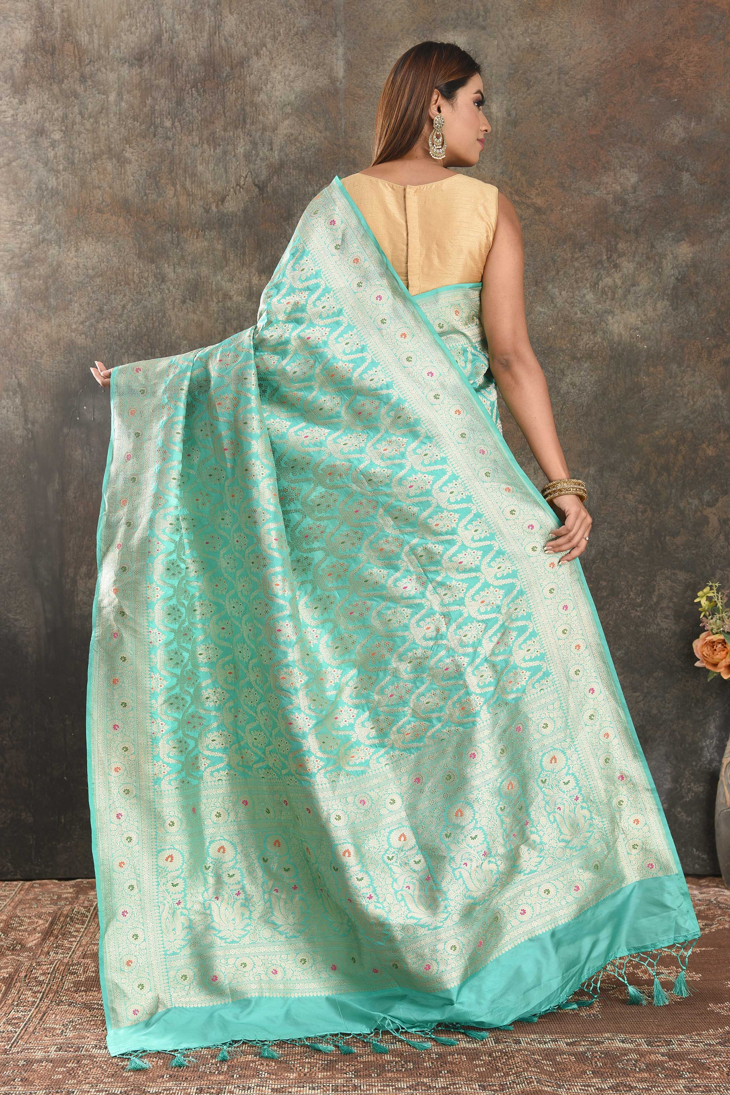 Shop pastel blue Katan silk Banarasi saree online in USA with zari work. Be vision of elegance on special occasions in exquisite designer sarees, handwoven sarees, georgette sarees, embroidered sarees, Banarasi saree, pure silk saris, tussar sarees from Pure Elegance Indian saree store in USA.-back