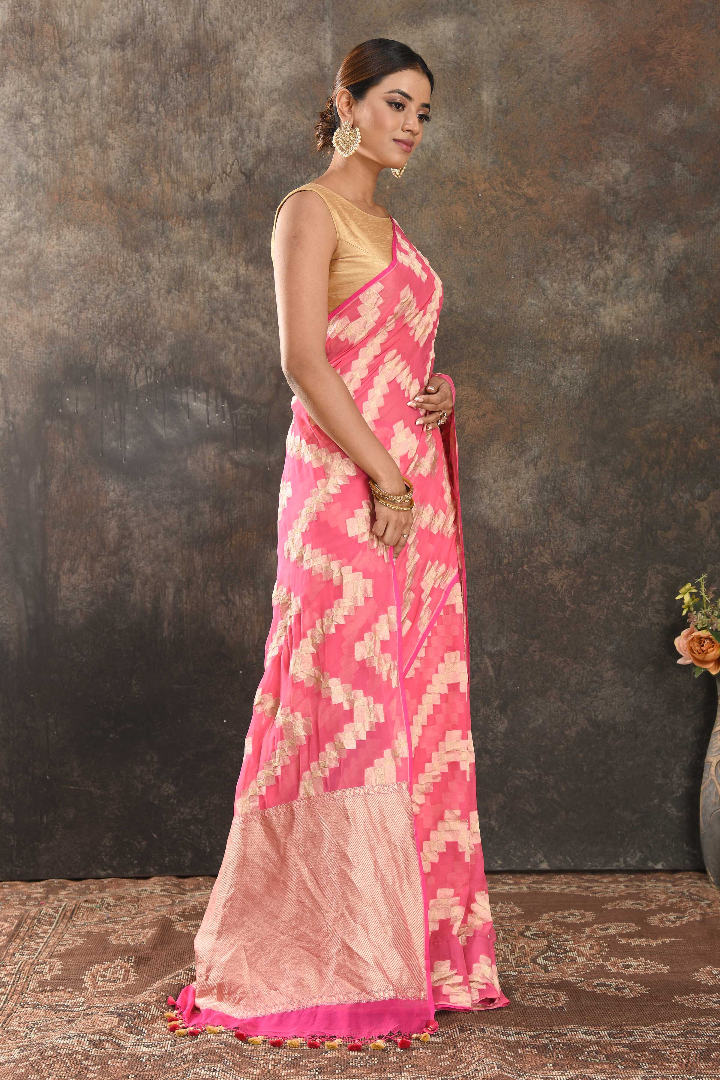 Buy beautiful light pink borderless georgette saree online in USA with golden chevron design. Be the center of attraction on special occasions in ethnic sarees, designer sarees, embroidered sarees, handwoven sarees, pure silk sarees from Pure Elegance Indian saree store in USA.-side
