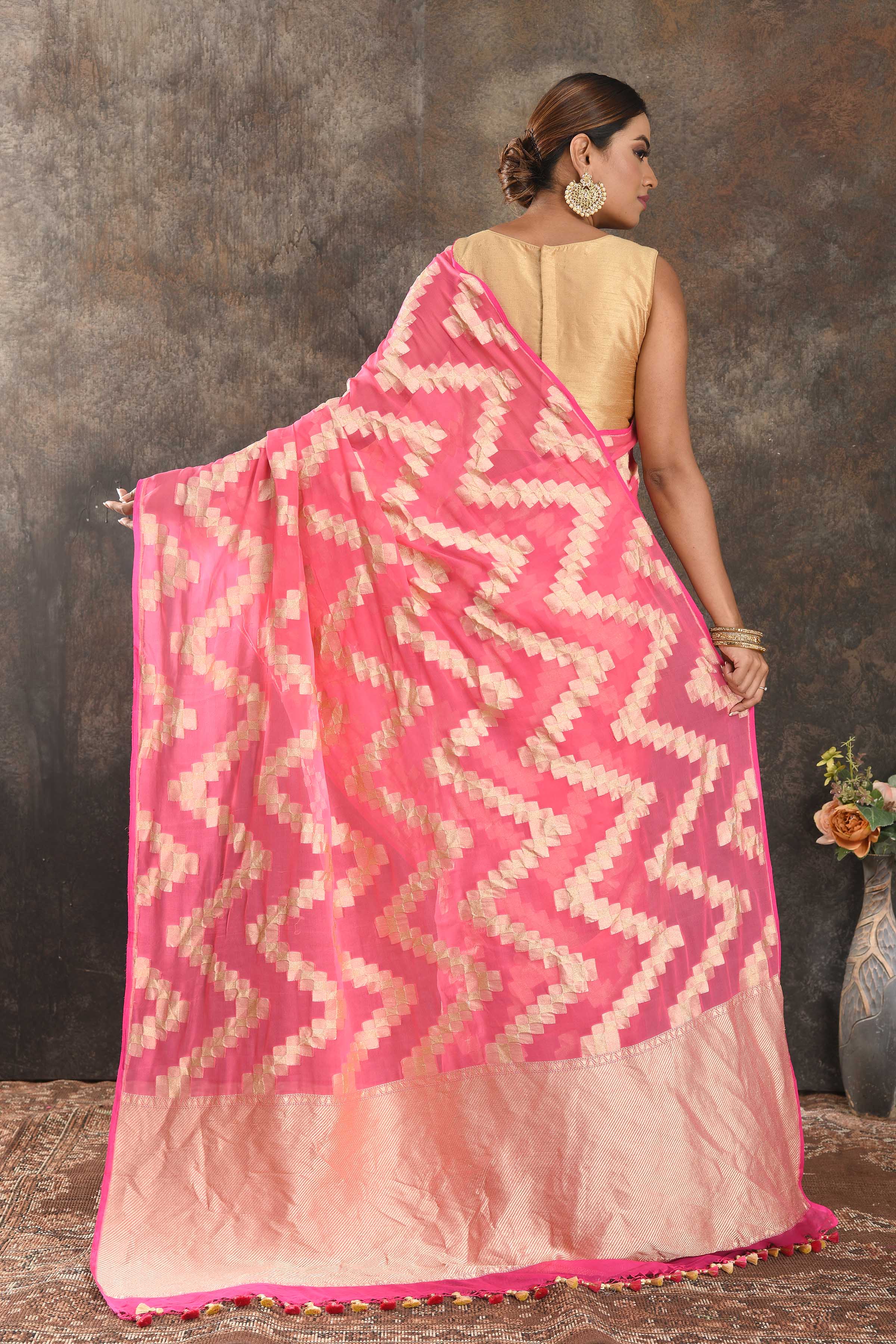 Buy beautiful light pink borderless georgette saree online in USA with golden chevron design. Be the center of attraction on special occasions in ethnic sarees, designer sarees, embroidered sarees, handwoven sarees, pure silk sarees from Pure Elegance Indian saree store in USA.-back