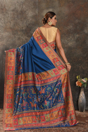 Shop stunning blue Kani silk saree online in USA. Keep your ethnic wardrobe up to date with latest designer sarees, pure silk sarees, handwoven saris, tussar silk sarees, Kani sarees, Pashmina sarees, embroidered sarees from Pure Elegance Indian saree store in USA.-back