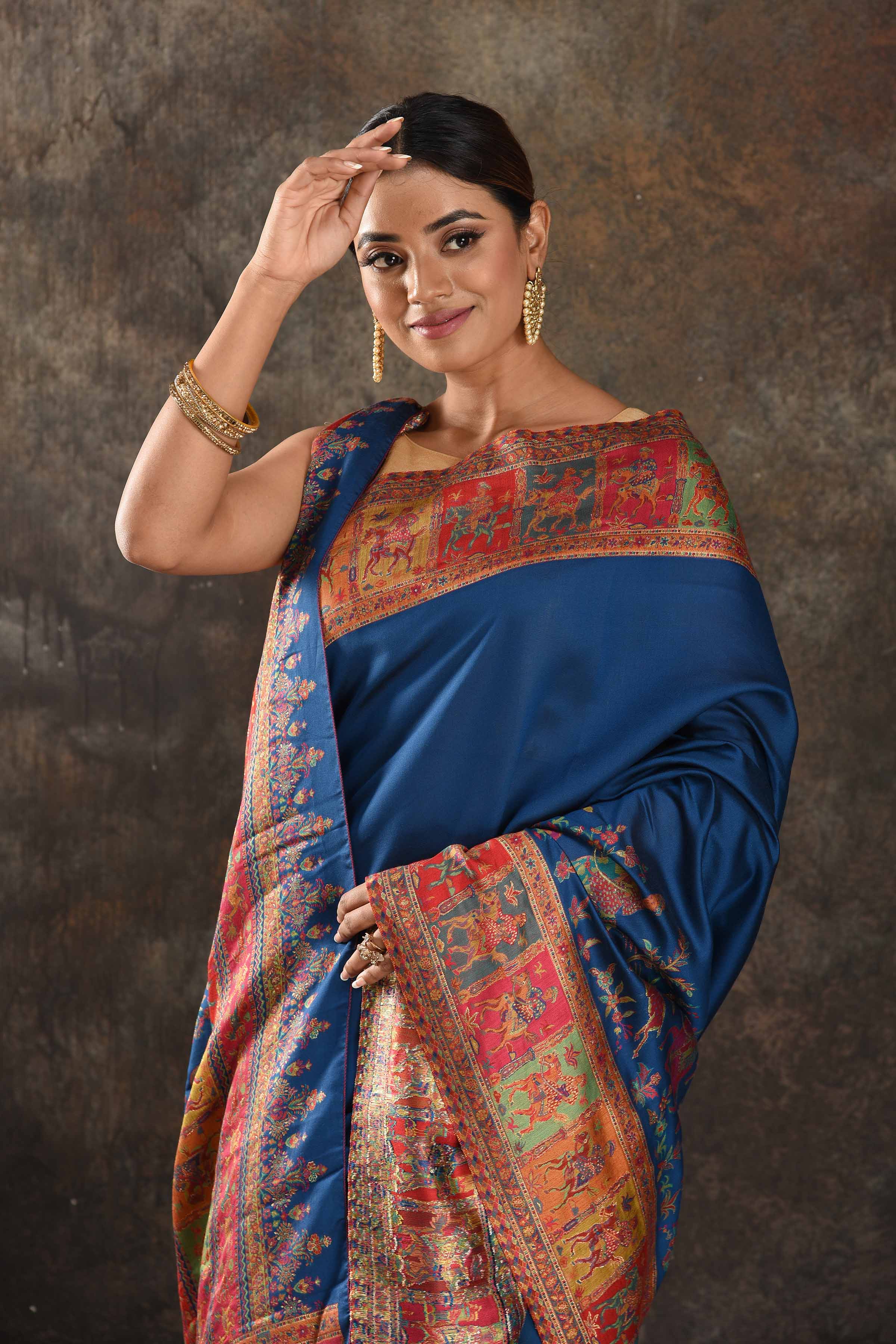 Shop stunning blue Kani silk saree online in USA. Keep your ethnic wardrobe up to date with latest designer sarees, pure silk sarees, handwoven saris, tussar silk sarees, Kani sarees, Pashmina sarees, embroidered sarees from Pure Elegance Indian saree store in USA.-closeup
