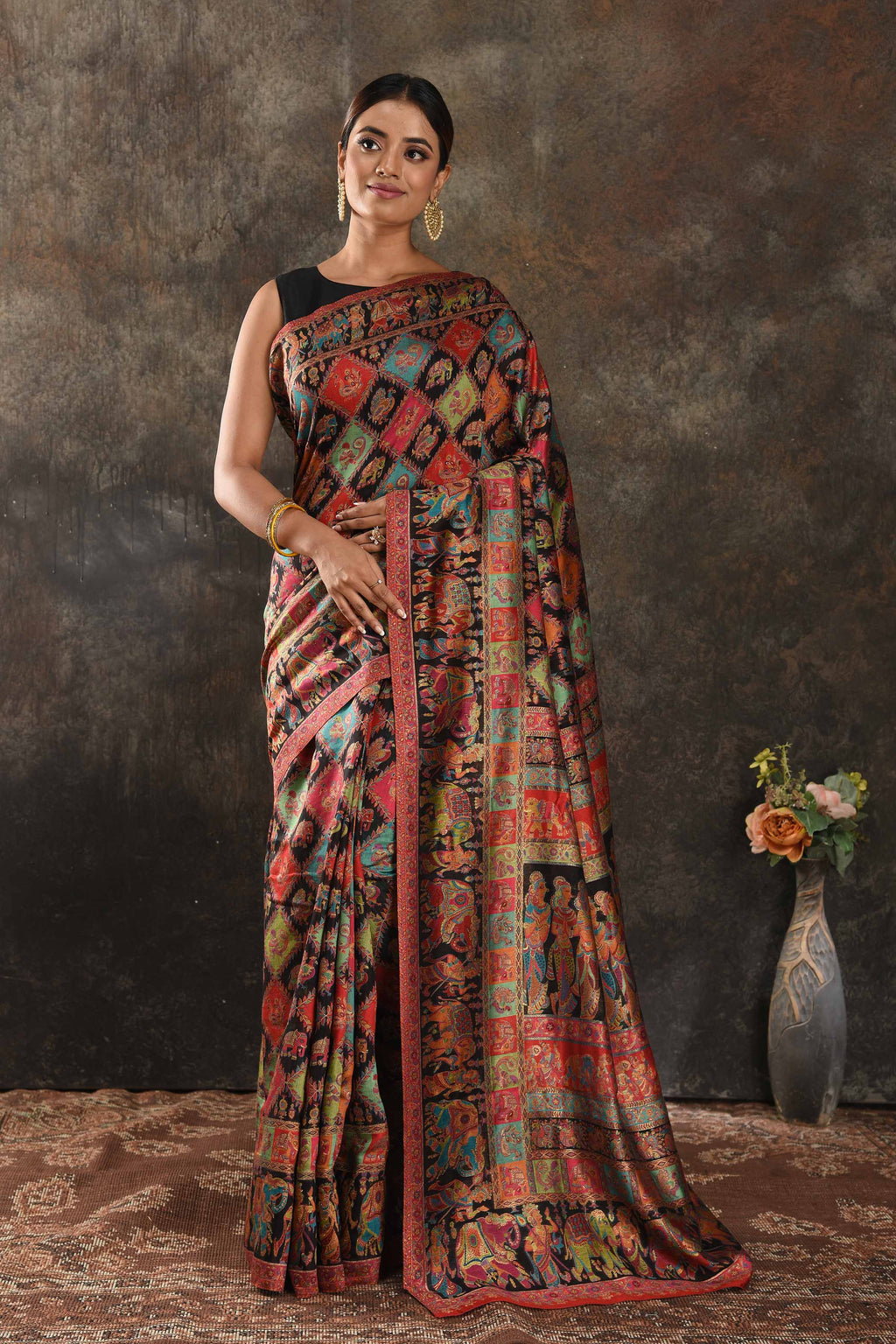 Buy stunning black Kani silk sari online in USA. Keep your ethnic wardrobe up to date with latest designer sarees, pure silk sarees, handwoven saris, tussar silk sarees, Kani sarees, Pashmina sarees, embroidered sarees from Pure Elegance Indian saree store in USA.-full view