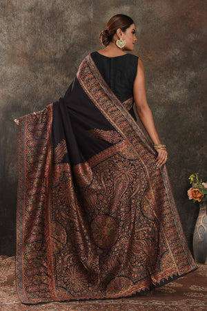 Buy beautiful black Kani weave tussar muga saree online in USA. Keep your ethnic wardrobe up to date with latest designer sarees, pure silk sarees, handwoven saris, tussar silk sarees, Kani sarees, Pashmina saris, embroidered sarees from Pure Elegance Indian saree store in USA.-back