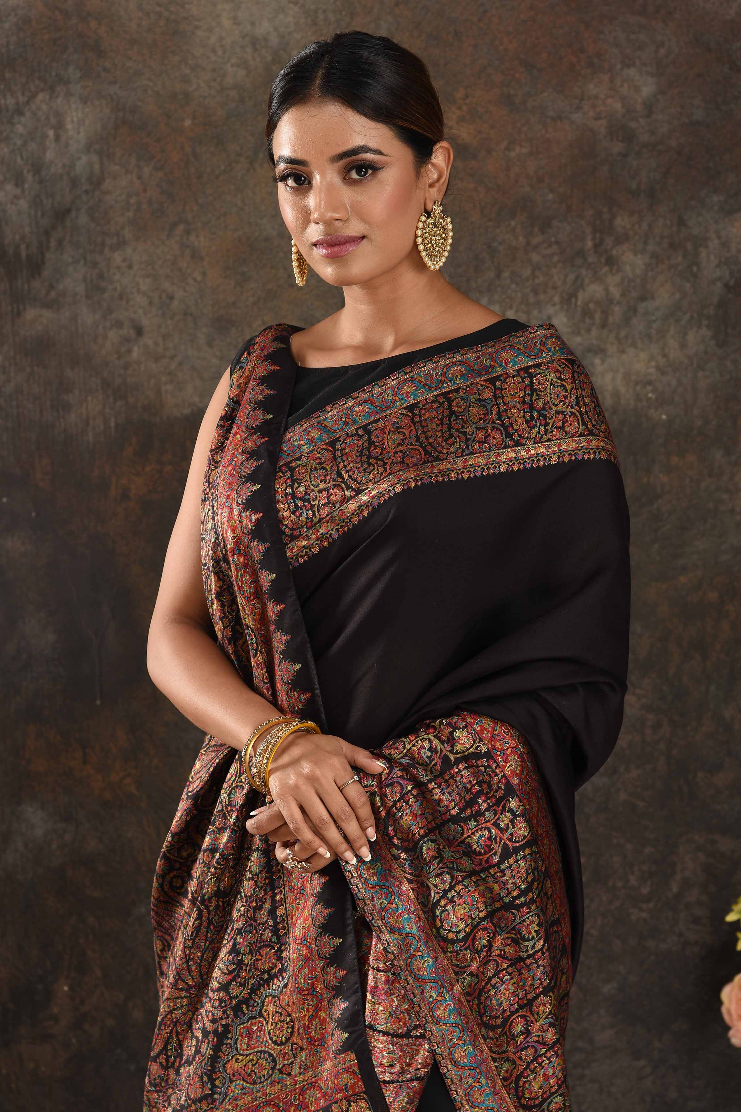 Buy beautiful black Kani weave tussar muga saree online in USA. Keep your ethnic wardrobe up to date with latest designer sarees, pure silk sarees, handwoven saris, tussar silk sarees, Kani sarees, Pashmina saris, embroidered sarees from Pure Elegance Indian saree store in USA.-closeup