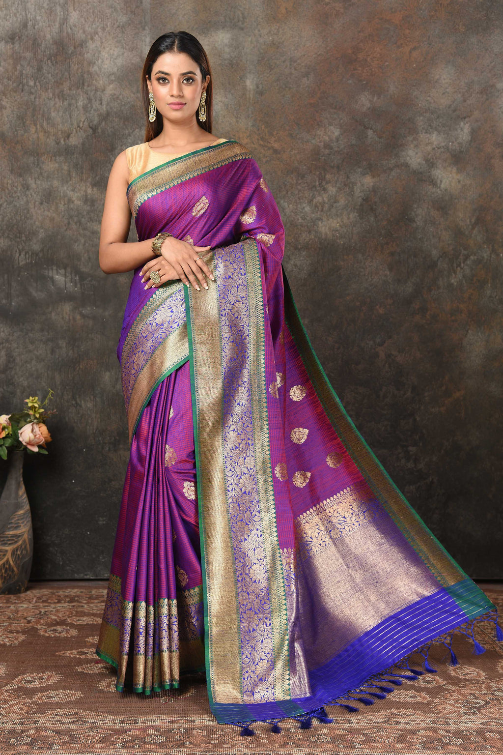 Buy beautiful pinkish purple Banarasi saree online in USA with green zari border. Look royal at weddings and festive occasions in exquisite Banarasi sarees, handwoven sarees, tussar silk sarees, Bollywood sarees, partywear sarees from Pure Elegance Indian saree store in USA.-full view