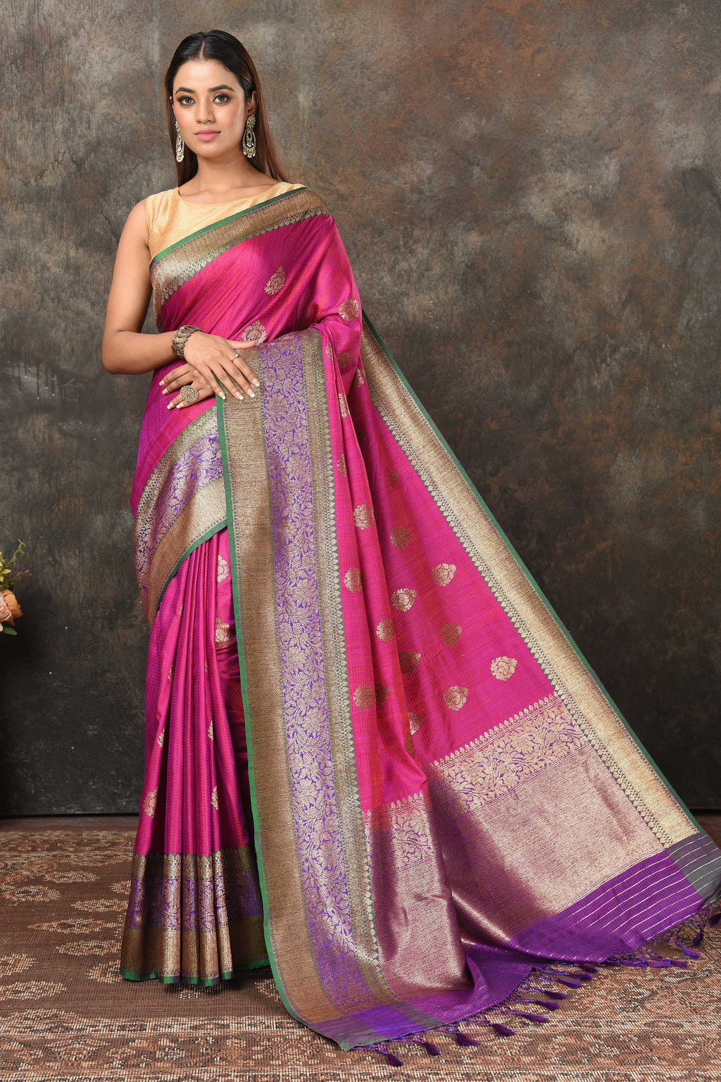 Shop beautiful magenta Banarasi saree online in USA with purple green zari border. Look royal at weddings and festive occasions in exquisite Banarasi sarees, handwoven sarees, tussar silk sarees, Bollywood sarees, partywear sarees from Pure Elegance Indian saree store in USA.-full view